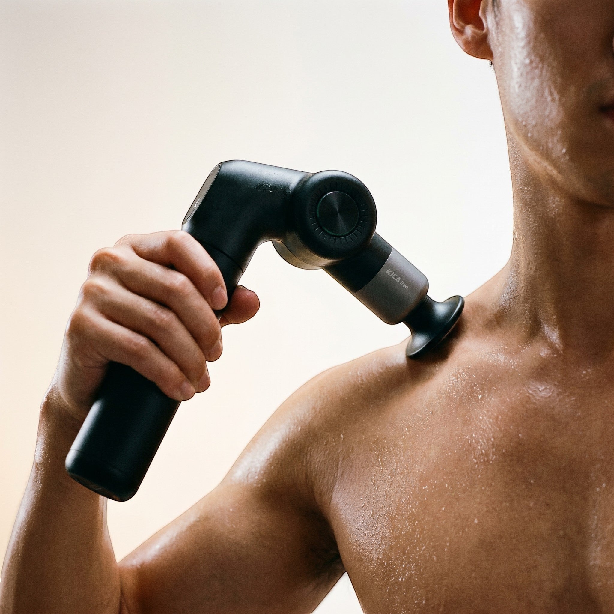 Heated massage gun with multiple attachments providing deep tissue muscle relief and recovery at home